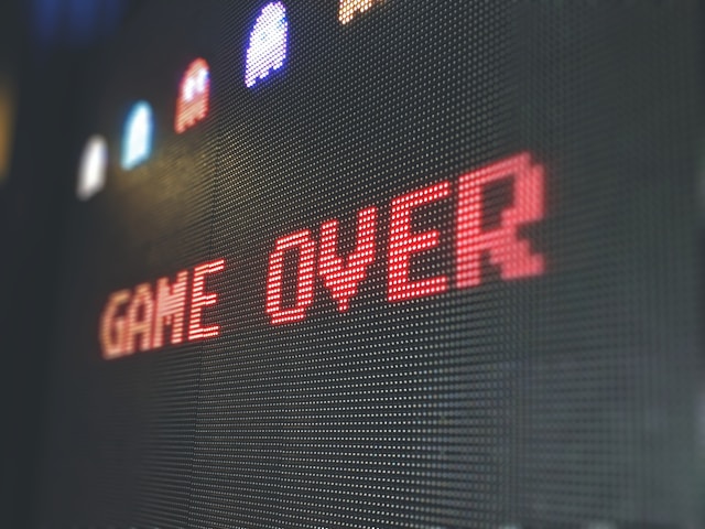 A screen shows the message, “Game over.”
