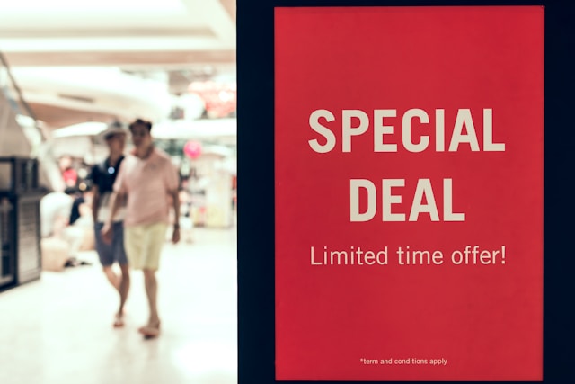 A sign inside a mall reads, “Special deal, limited time offer!”
