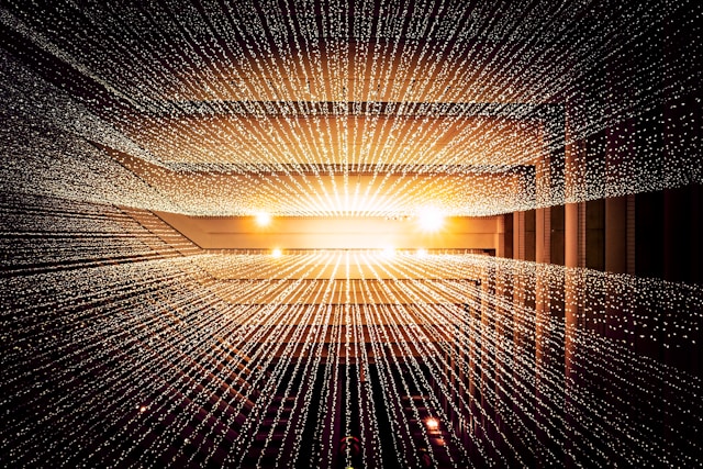 A digital representation of cloud storage with countless dots of light forming rows to represent data files. 
