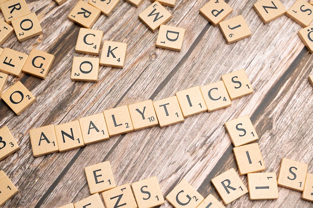 Several Scrabble tiles form the word “ANALYTICS.”
