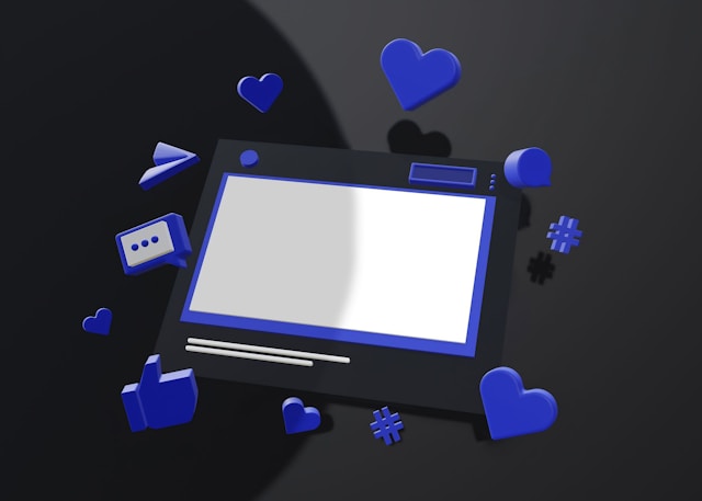 Popular social media react emojis surround a black tablet with a white screen.