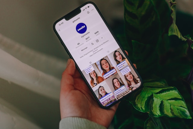 A smartphone screen displays a TikTok profile page. 
