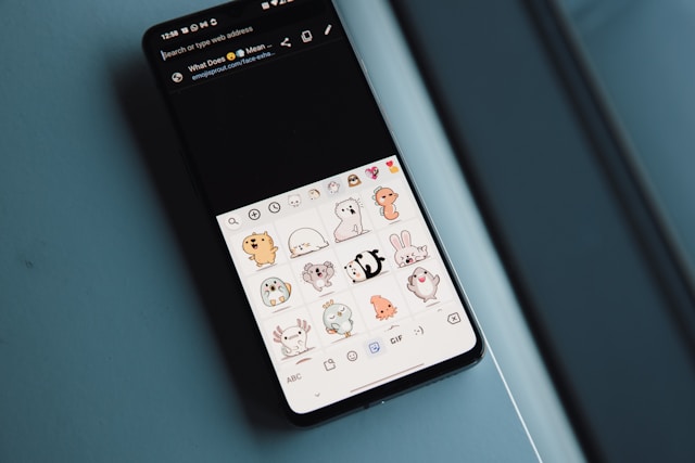 A phone screen displays the operating system’s special animal emoji stickers. 
