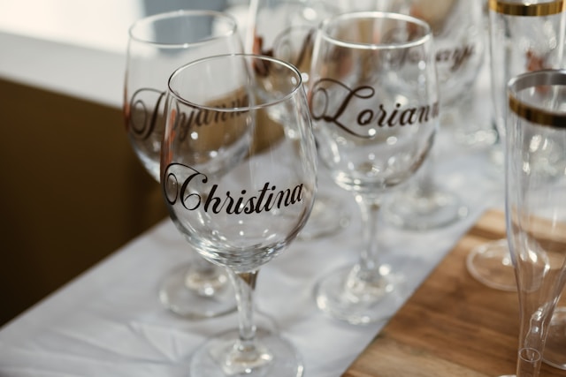 Wine glasses with name stickers. 

