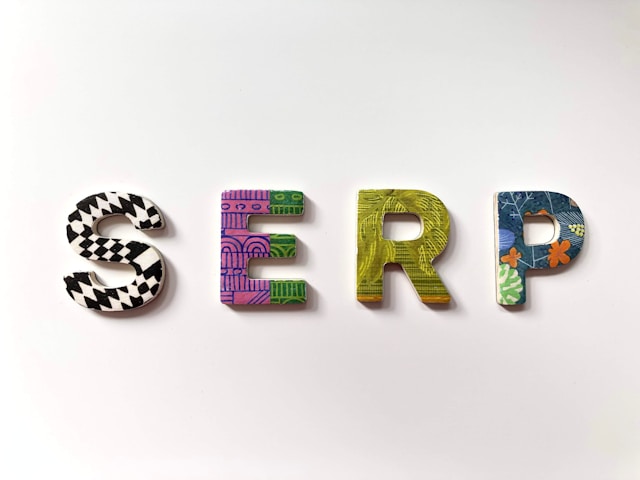 Colorful letter tiles spell the acronym “SERP.”
