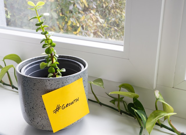 A yellow sticky note with the hashtag symbol printed on it. 
