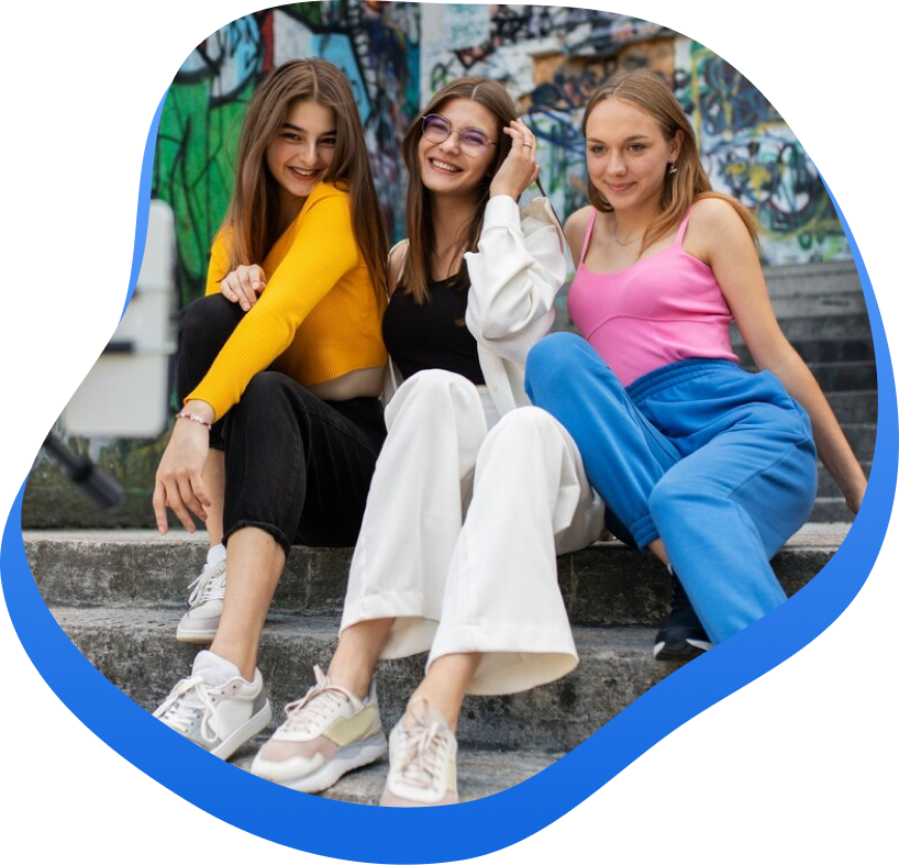 High Social's graphic showing three TikTok influencers sitting on outdoor steps posing for their TikTok video recording.